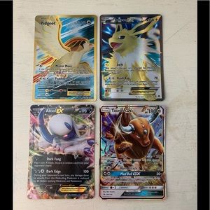 4 Ex/Gx Pokémon cards.